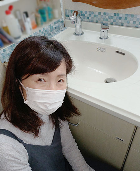 施工後の蛇口とお客様