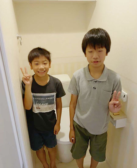交換したトイレとお客様