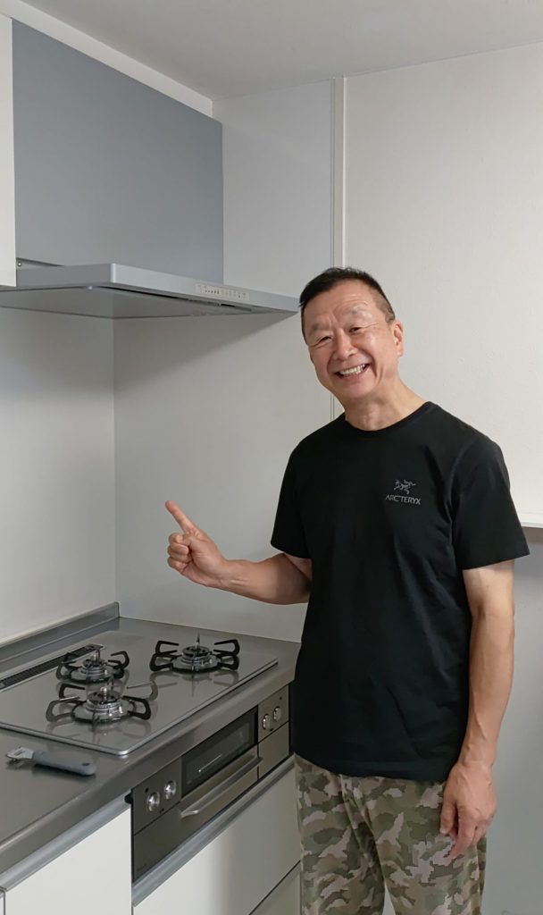 施工後のコンロとお客様