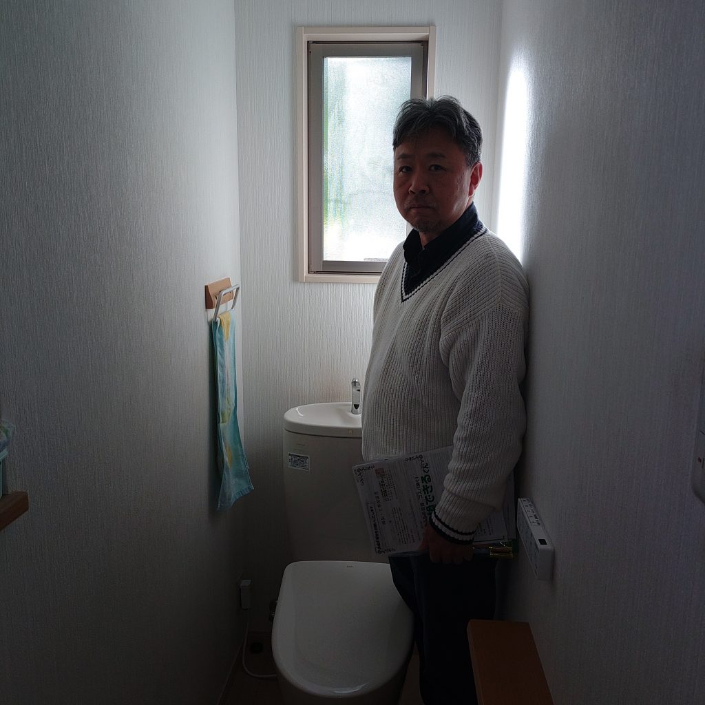 施工後の便座とお客様